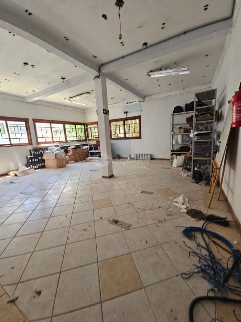 Foto 9 de 63: Comercial em leilão em Porto Alegre - RS, bairro Higienópolis — LOTE 001 Prédio na Rua Luzitana, 933, Higienópolis, Porto Alegre/RS