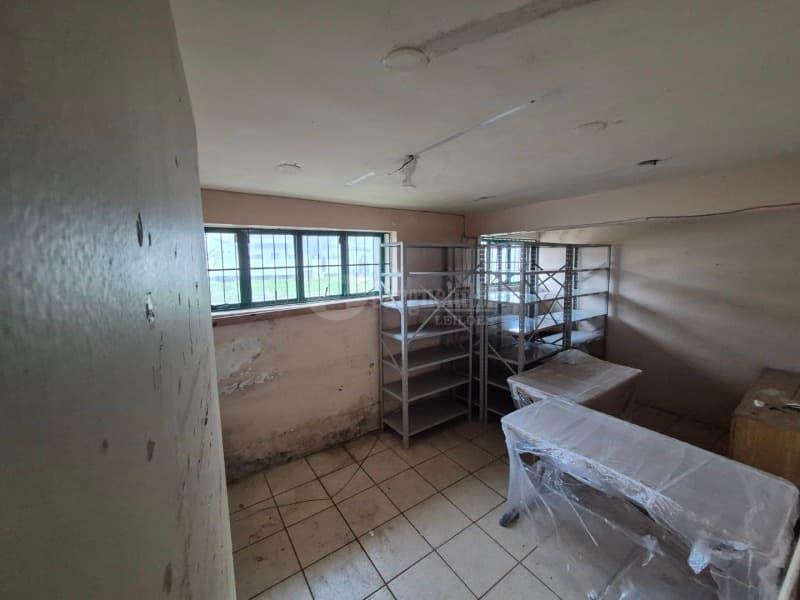 Foto 18 de 39: Comercial em leilão em Cruz Alta - RS — LOTE 027 Prédio de alvenaria com aprox. 1.189,33 m², sito à Rua Pinheiro Machado, nº 1515, esquina c