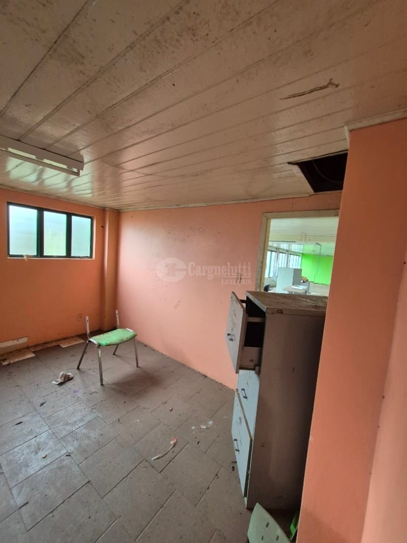 Foto 36 de 39: Comercial em leilão em Cruz Alta - RS — LOTE 027 Prédio de alvenaria com aprox. 1.189,33 m², sito à Rua Pinheiro Machado, nº 1515, esquina c