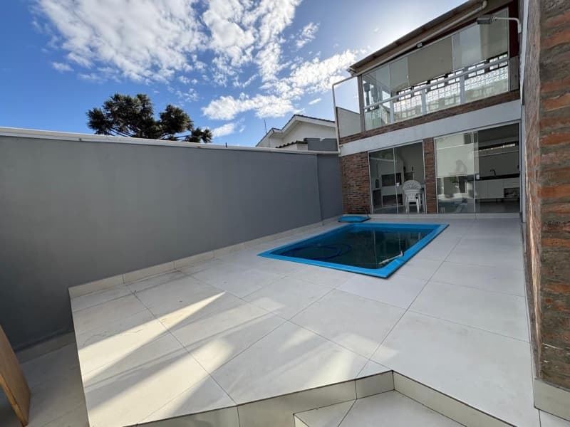 Foto 6 de 26: Casa em leilão em Porto Alegre - RS, bairro Cristal — LOTE 001 CASA (DESOCUPADA) NA AVENIDA PINHEIRO BORDA (PRÓXIMA AO PONTAL SHOPPING)