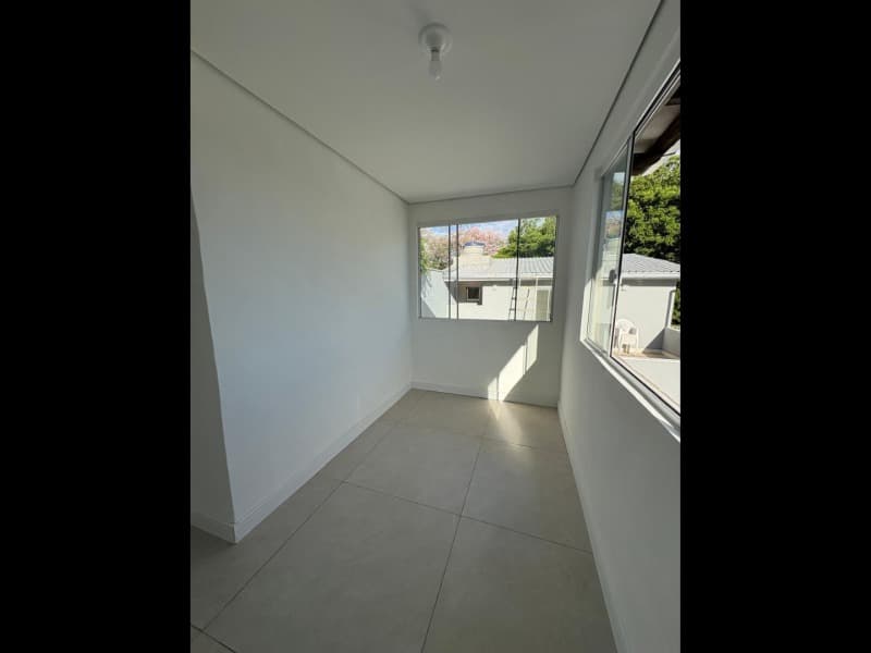 Foto 14 de 26: Casa em leilão em Porto Alegre - RS, bairro Cristal — LOTE 001 CASA (DESOCUPADA) NA AVENIDA PINHEIRO BORDA (PRÓXIMA AO PONTAL SHOPPING)