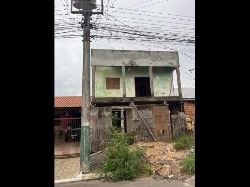 Foto 2 de 16: Terreno em leilão em Alvorada - RS — LOTE 001 TERRENO (COM CONSTRUÇÃO INACABADA) NO LOTEAMENTO ALGARVE EM ALVORADA / RS