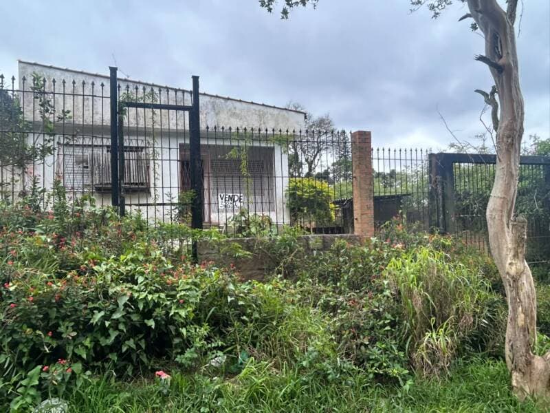 Foto 1 de 5: Casa em leilão em Porto Alegre - RS, bairro Glória — LOTE 001 CASA NO BAIRRO GLÓRIA