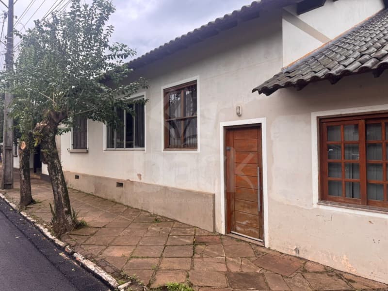 Foto 1 de 5: Terreno em leilão em Sinimbu - RS, bairro Centro — LOTE 001 Um terreno com 467,07m² com residência de 183,52 m² em Sinimbu/RS