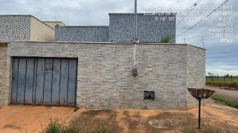 Casa em leilão em Guapó - GO, bairro Setor Central — LOTE 063 LOT RES BANDEIRA-8444427747733