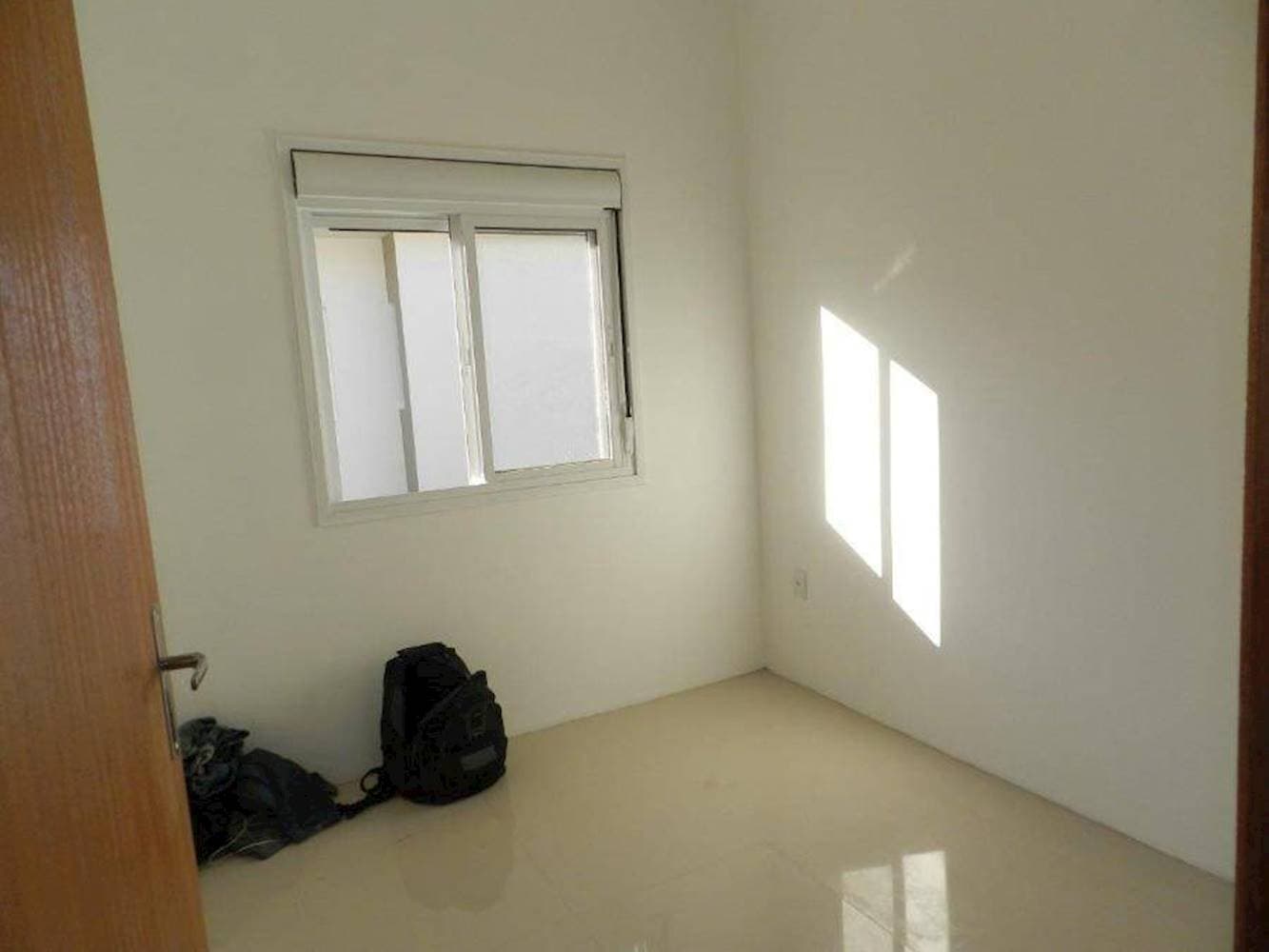 Foto 14 de 17: Casa em leilão em Canoas - RS — Casa no Residencial Gois em Mathias Velho - Canoas/RS