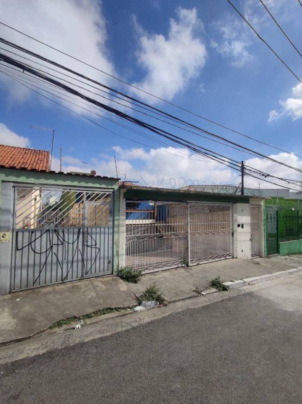 Foto 1 de 24: Casa em leilão em São Paulo - SP, bairro Guaianases — Casa em Guaianases - São Paulo/SP