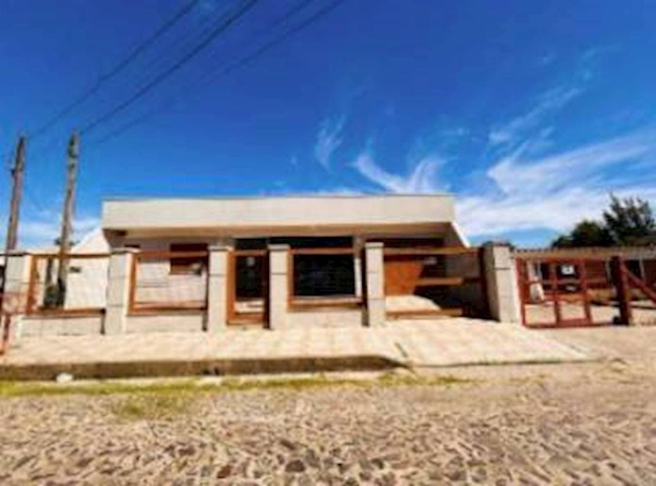 Foto 1 de 12: Casa em leilão em Tramandaí - RS, bairro Zona Nova — Casa na Zona Nova - Tramandaí/RS