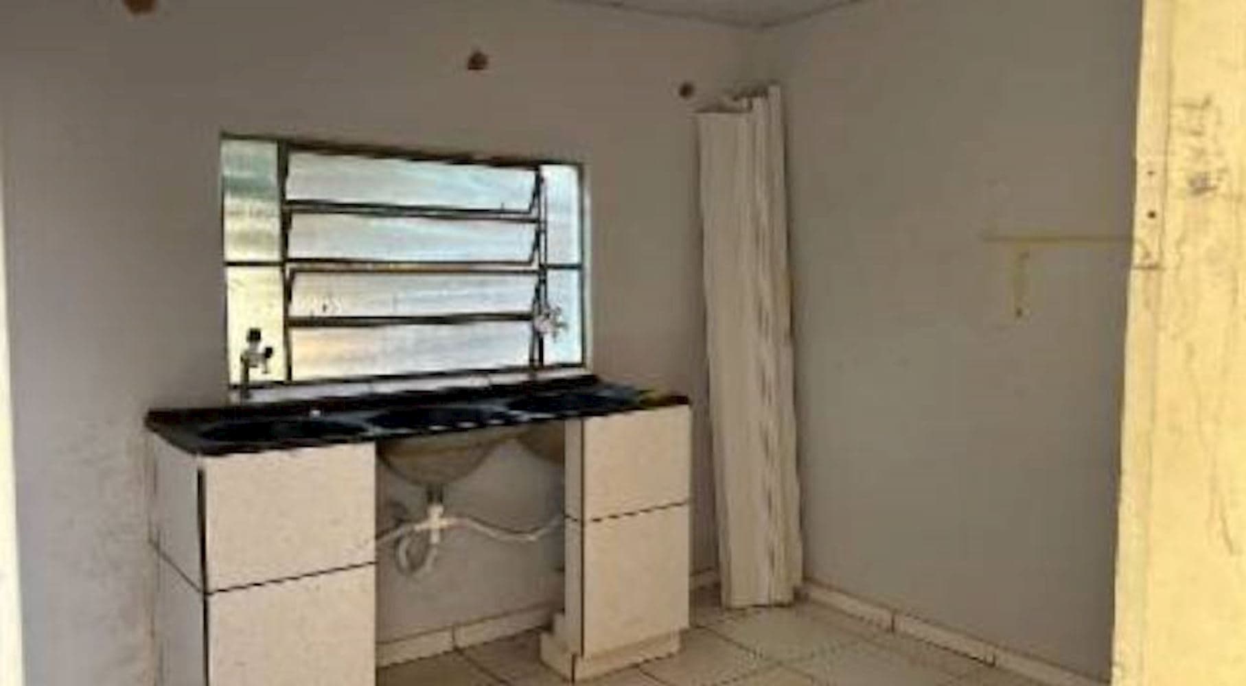 Foto 5 de 13: Casa em leilão em Cassilândia - MS, bairro Vila Pernambuco — Casa na  Vila Pernambuco - Cassilândia/MS