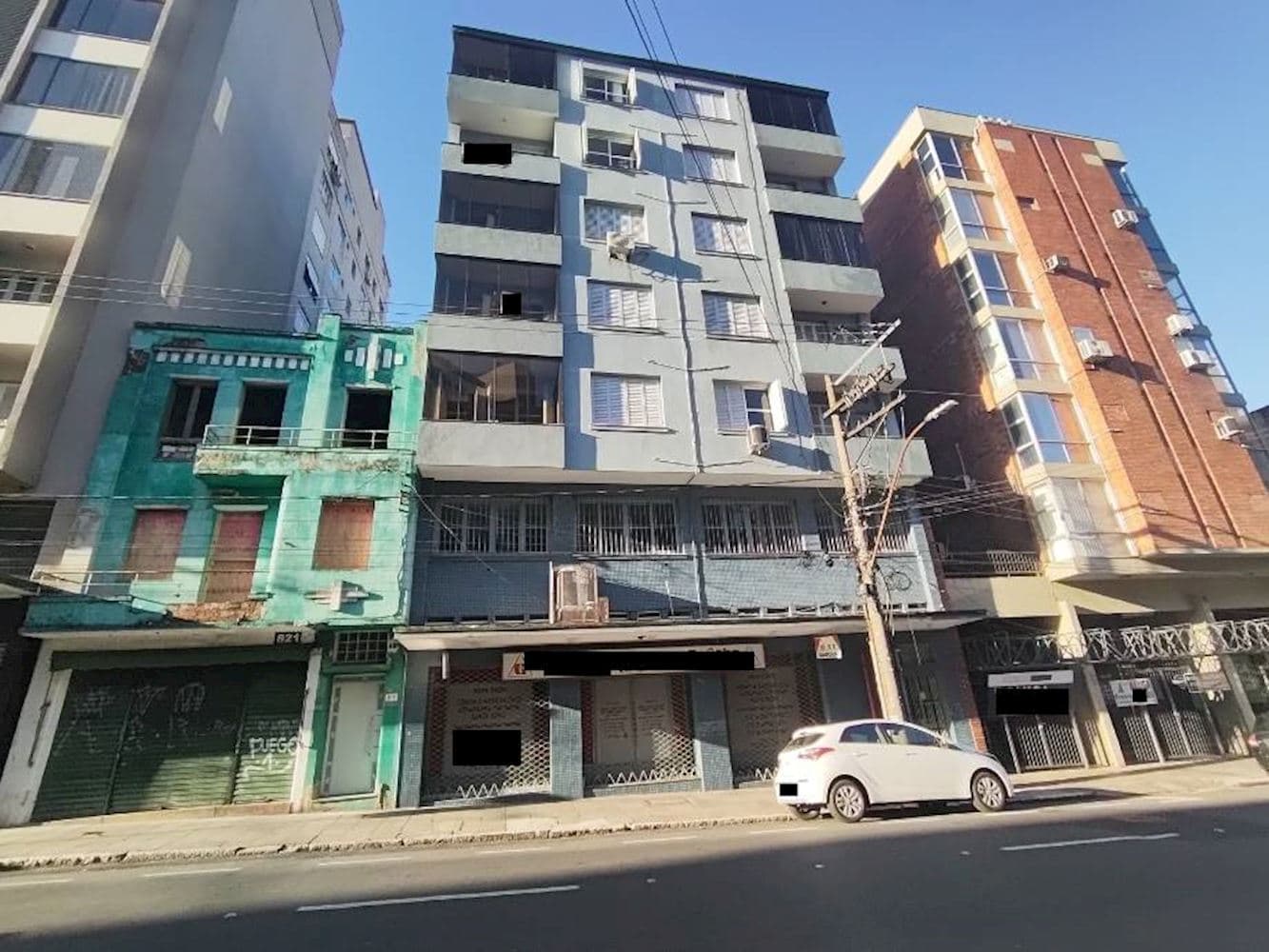 Foto 1 de 10: Comercial em leilão em Porto Alegre - RS, bairro Independencia — Sala Comercial no "Edifício Estoril" - Independência - Porto Alegre/RS