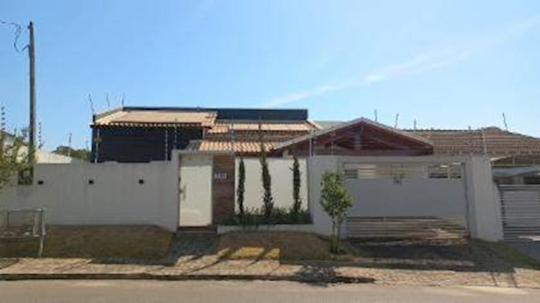 Foto 1 de 15: Casa em leilão em Juara - MT, bairro Centro — Casa no Centro - Juara/MT