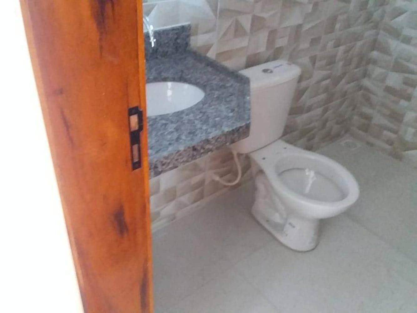 Foto 10 de 17: Casa em leilão em Parnaíba - PI, bairro Dirceu Arcoverde — Casa em Dirceu Arcoverde - Parnaíba/PI