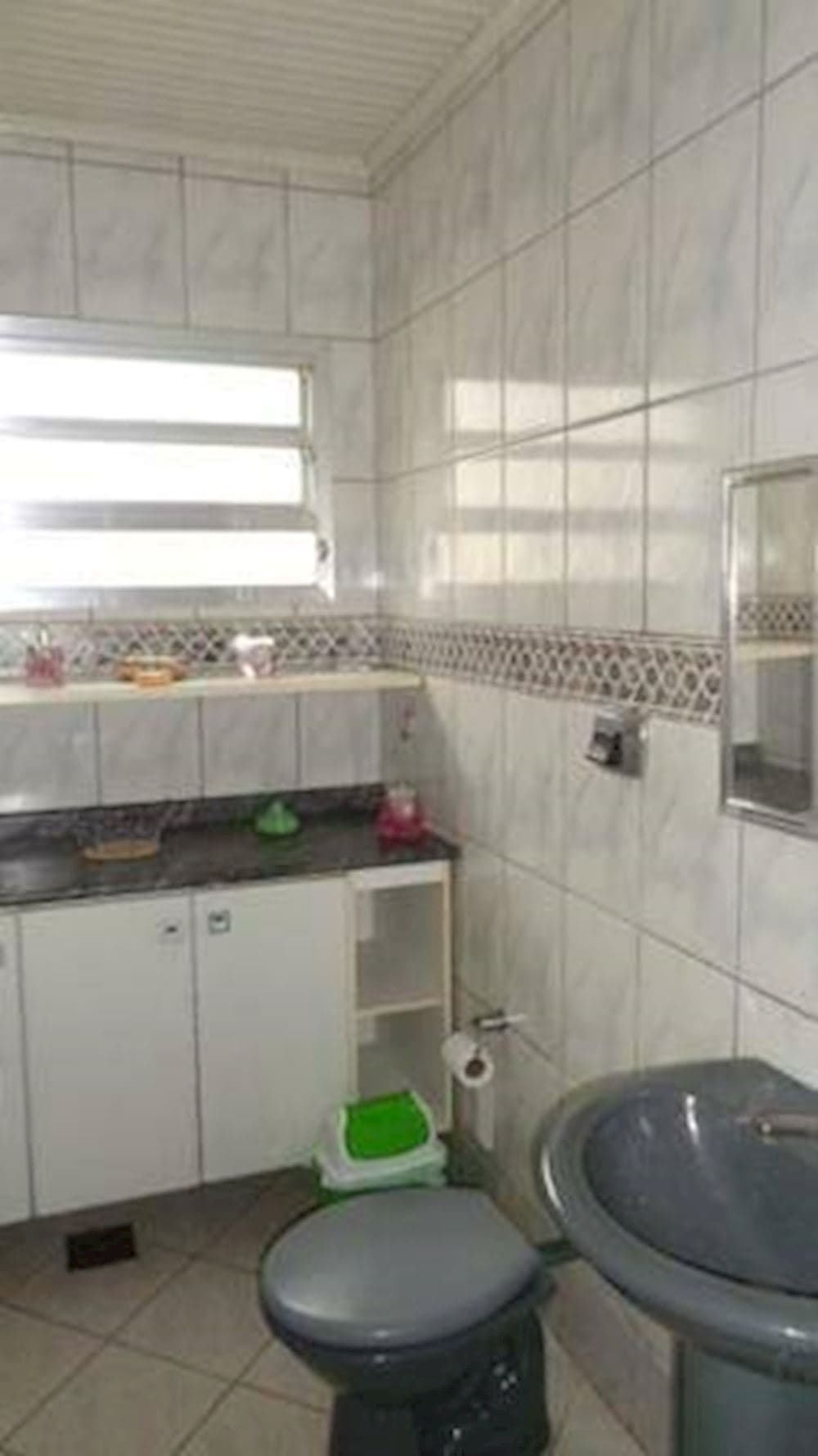 Foto 13 de 18: Casa em leilão em Canoas - RS, bairro Rio Branco — Casa em Rio Branco - Canoas/RS