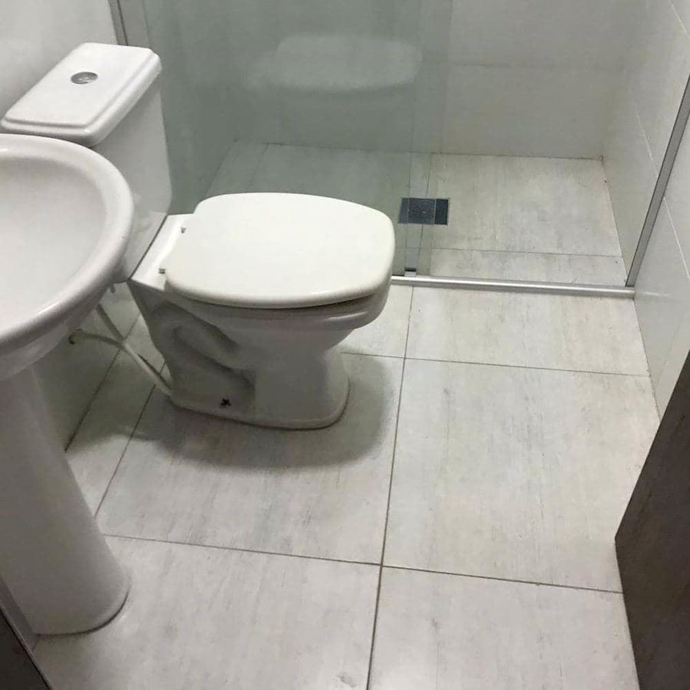 Foto 6 de 9: Casa em leilão em Canoas - RS, bairro Harmonia — Casa em Harmonia - Canoas/RS