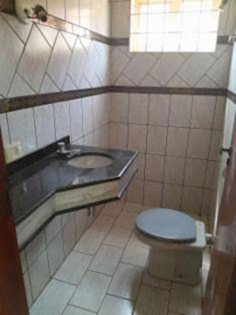 Foto 11 de 15: Casa em leilão em Campo Grande - MS, bairro Jardim Tijuca — Casa no Jardim Tijuca em Campo Grande/MS