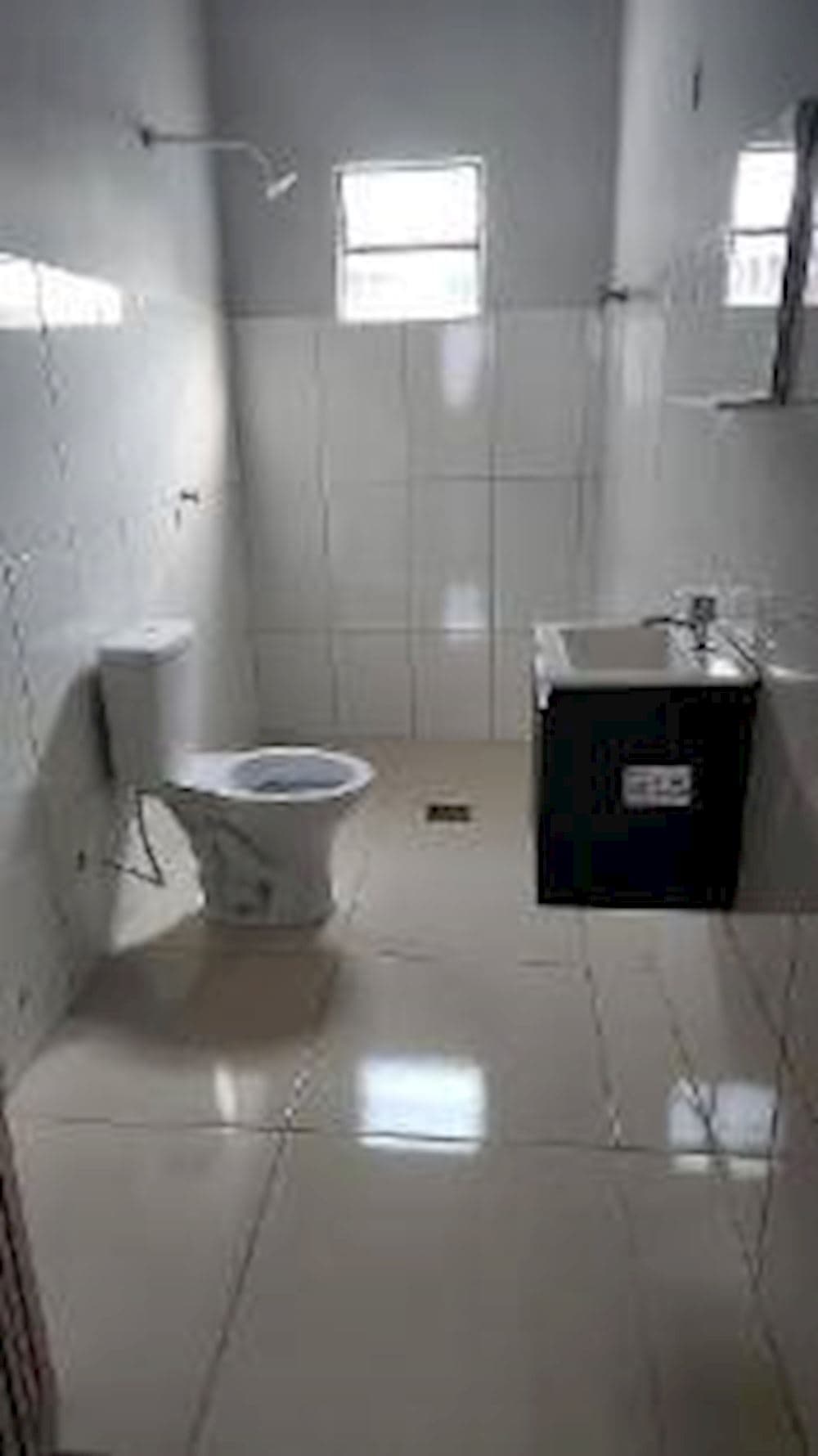 Foto 7 de 14: Casa em leilão em Araguaína - TO, bairro Sao Miguel — Casa no Sao Miguel em Araguaína/TO