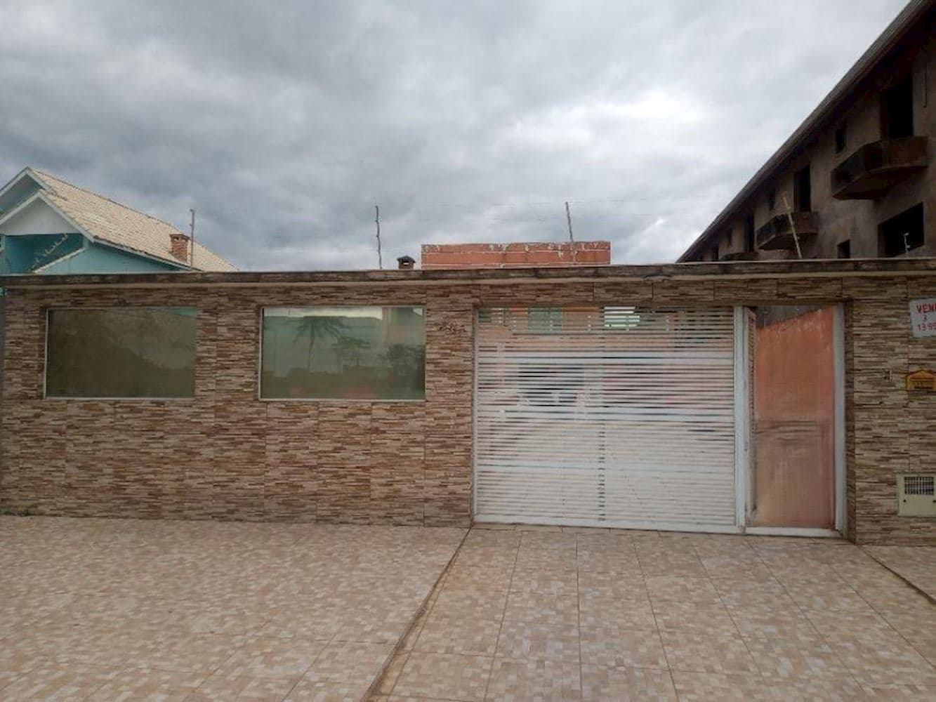 Foto 1 de 13: Casa em leilão em Peruíbe - SP, bairro Centro — Casa - Cidade Balneária Peruíbe - Peruíbe/SP