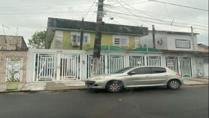 Foto 1 de 2: Casa em leilão em Praia Grande - SP, bairro Nova Mirim — Casa 67 m² - Praia Grande-SP - Rua Adolfo Lopes Enriques, 300 - Casa 04 - Nova Mirim (Jd. Aloha)