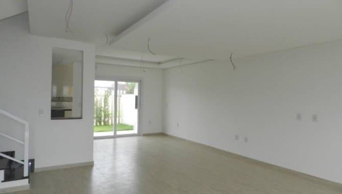 Foto 4 de 15: Casa em leilão em Porto Alegre - RS, bairro Hípica — Casa em Condomínio 184 m² (01 vaga) - Hípica - Porto Alegre - RS