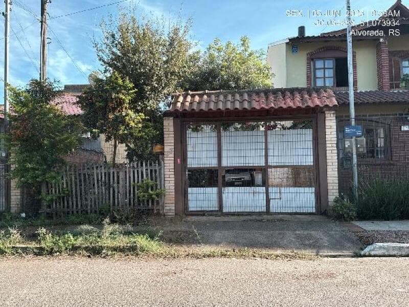 Casa em leilão em Alvorada - RS, bairro Jardim Algarve — LOTE 376 IMOVEL