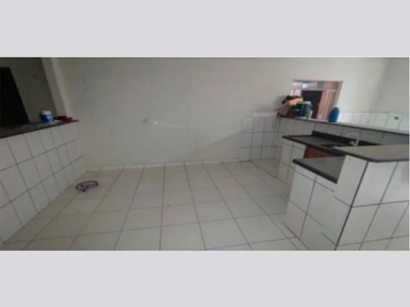 Foto 4 de 5: Terreno em leilão em Paranaíta - MT, bairro Setor Comercial — Prédio - Paranaíta - MT