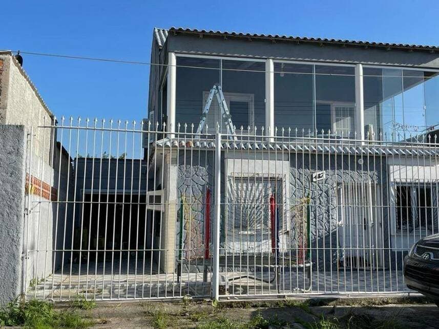 Foto 1 de 17: Casa em leilão em Pelotas - RS — Casa à venda em leilão