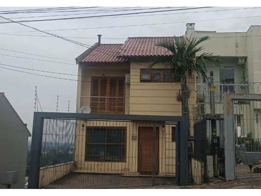 Foto 1 de 14: Casa em leilão em Porto Alegre - RS — Casa à venda em leilão
