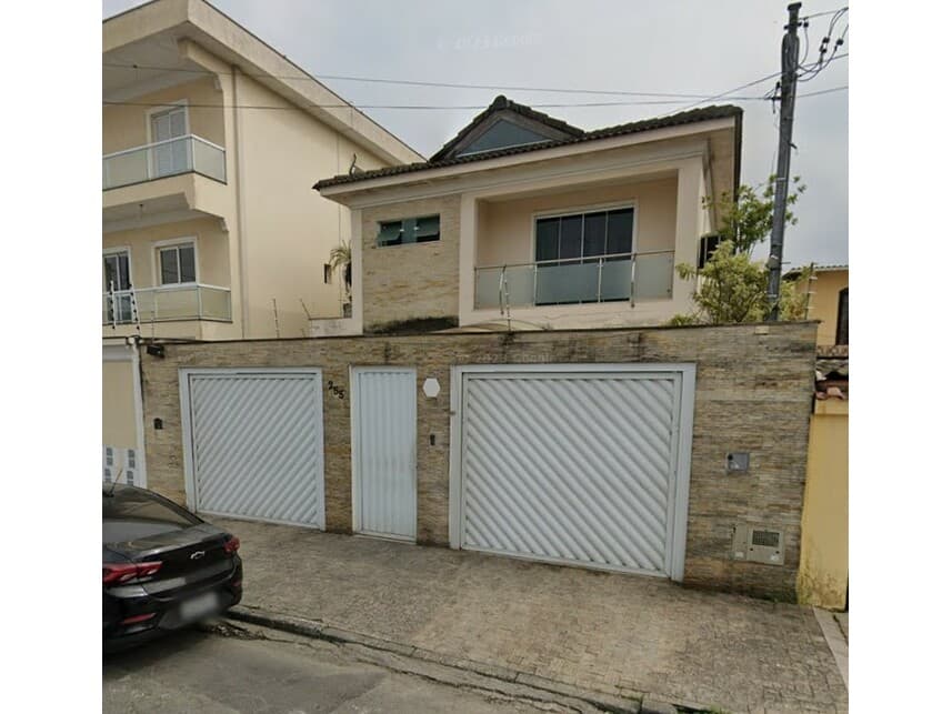 Foto 1 de 7: Casa em leilão em Guarujá - SP — Sobrado à venda em leilão