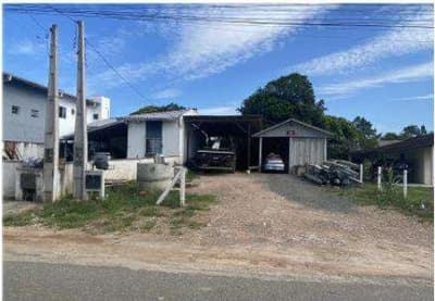 Foto 2 de 11: Comercial em leilão em Barra Velha - SC — Lote urbano nº 04 da quadra A, com área de 318m², com benfeitorias sem valor comercial, localizado na Rua Atanásio Pinheiro, 73, Jardim Elaine II, Barra Velha/SC