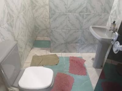 Foto 12 de 15: Casa em leilão em Caldas Novas - GO — Casa 178m² com Terreno 608m² | Caldas Novas-GO | Caldas do Oeste - Ampla com 4 Dorms e Varanda - Financiamento até 420 Meses!
