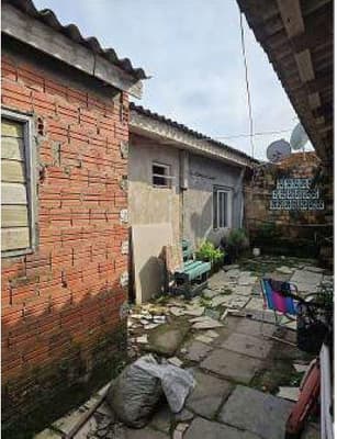 Foto 2 de 18: Terreno em leilão em Capão Da Canoa - RS, bairro Arco Íris — Terreno com àrea de 250,00m² e uma área construída de 90,00m². Situado na Rua Rigel, 261, Arco Íris, Capão da Canoa/RS.