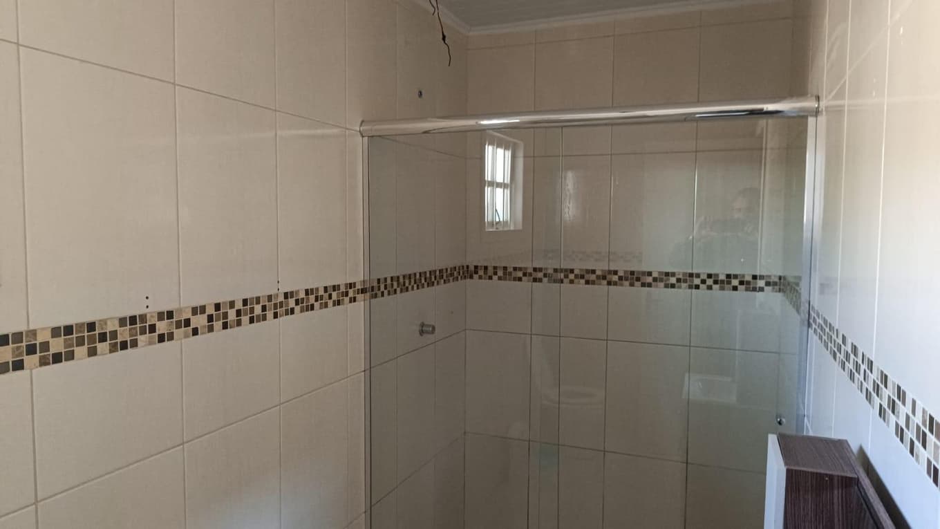 Foto 12 de 34: Casa em leilão em Marmeleiro - PR, bairro Centro — Imóvel Urbano com Benfeitorias