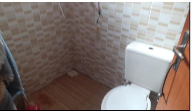 Foto 13 de 13: Casa em leilão em Padre Bernardo - GO, bairro Loteamento Vila Divin — Ocupado, 65.0 m2, PADRE BERNARDO / GO