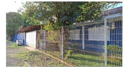 Foto 1 de 14: Terreno em leilão em Pontal Do Paraná - PR — Terreno com área de 1.077,00m², contendo uma casa com piscina, localizado na Avenida Panamérica, nº 533 Pontal do Sul/Pontal do Paraná/PR