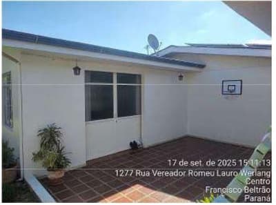 Foto 11 de 13: Casa em leilão em Francisco Beltrão - PR, bairro Centro — Teereno co área de 948,02m², com benfeitoria de área total de 267,43m², localizado na Rua Vereador Romeu Lauro Werlang, 1277, Bairro: Centro, Francisco Beltrão/PR