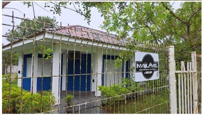 Foto 12 de 14: Terreno em leilão em Pontal Do Paraná - PR — Terreno com área de 1.077,00m², contendo uma casa com piscina, localizado na Avenida Panamérica, nº 533 Pontal do Sul/Pontal do Paraná/PR