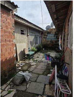Foto 16 de 18: Terreno em leilão em Capão Da Canoa - RS, bairro Arco Íris — Terreno com àrea de 250,00m² e uma área construída de 90,00m². Situado na Rua Rigel, 261, Arco Íris, Capão da Canoa/RS.
