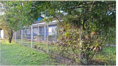 Foto 2 de 14: Terreno em leilão em Pontal Do Paraná - PR — Terreno com área de 1.077,00m², contendo uma casa com piscina, localizado na Avenida Panamérica, nº 533 Pontal do Sul/Pontal do Paraná/PR