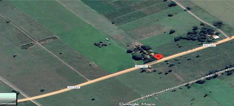 Foto 4 de 14: Area Rural em leilão em Campos Dos Goytacazes - RJ — ESTRADA CARROÇÁVEL - RIO DA