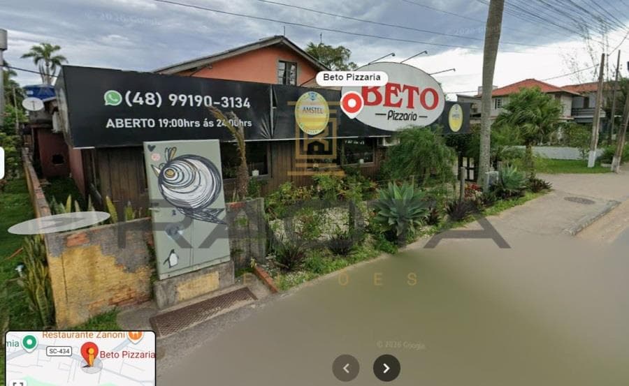 Foto 6 de 7: Terreno em leilão em Palhoça - SC — terreno com 1090,12m2 e 409,27 do prédio terreno praia Garopaba com 1090,,12m2